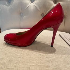 Stuart Weitzman 4 inch red patent pumps size 9.